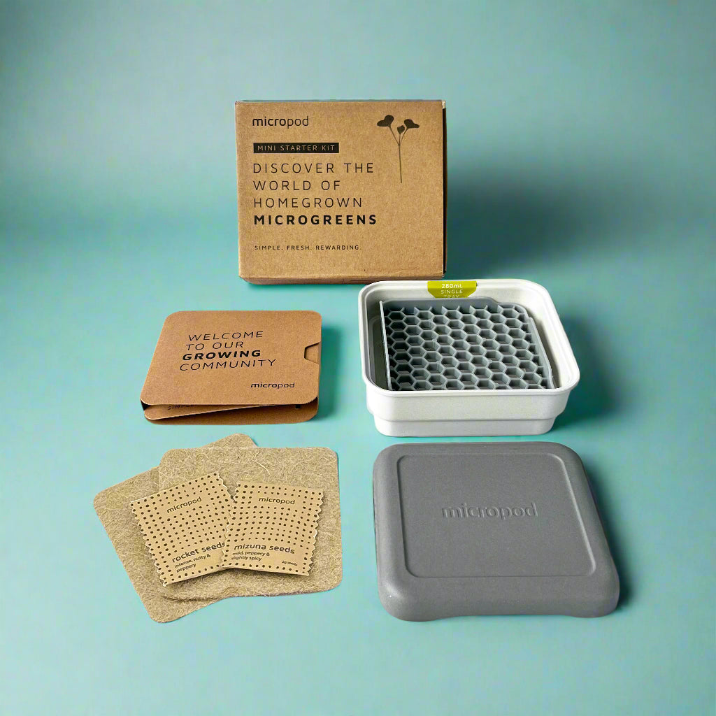 Micropod homegrown microgreens starter kit on a blue background